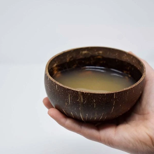 traditional kava shell in hand
